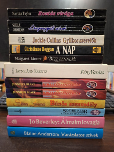 Jackie Collins, Jayne Ann Krentz, Christiane Heggan, Sindey Lawrence, Jennifer Blake, Sheila O'Hallion, Sophie Kerr, Blaine Anderson, Jo Beverley Margaret Moore - 11 db Romantikus kötet, KÖNYVMENTŐ AJÁNLAT: Bízz bennem, Gyilkos szeretők, Fény Varázs, A nap, Bűnös szenvedély, Királyi szenvedély I-II., Lángragyúlt szívek, Rontás virága, Lidérces házasság, Varázslatos szívek, Álmaim lovag