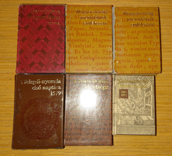6 nyomd�szattal kapcsolatos minik�nyv: Magyarorsz�g nyomd�inak eml�kezete I-II. Iparm�v�szet �s nyomd�szat 1882-1992, A Telegdi-nyomda els� napt�ra, 1579, M. T�tfalusi Kis Mikl�s Ments�ge, K�nyvnyomtat�s Magyarorsz�gon 1901-1973