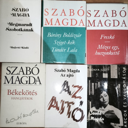 K�nya Judit Szab� Magda - 6db Szab� Magd�val kapcsolatos k�nyv (7 reg�ny 6 k�tetben)  - Szab� Magda-Megmaradt Szobotk�nak, H�rom reg�ny, Fresk�/M�zes egy, huszonkett�, B�kek�t�s, Az ajt�, K�nya Judit-Szab� Magda